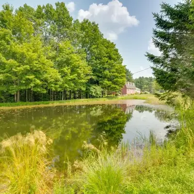Fire Pit and On-Site Pond Wooded Walton Home!