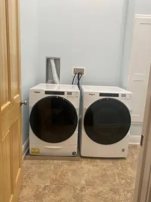 two microwaves sitting next to each other in a room at Church Bells in Wyalusing