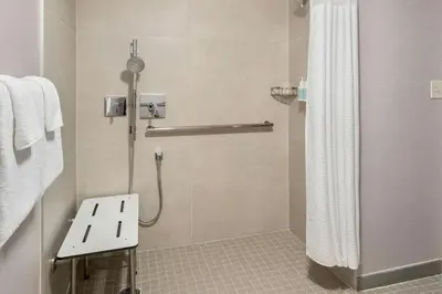 a bathroom with a shower with a shower curtain at Courtyard by Marriott Philadelphia Lansdale in Lansdale