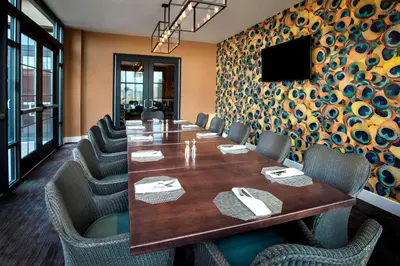 a conference room with a long table and chairs at Courtyard by Marriott Philadelphia Lansdale in Lansdale