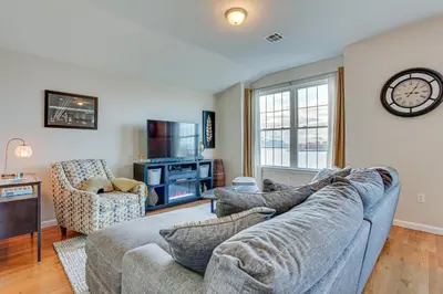 a living room with a couch and two chairs at Bayfront New Jersey Escape about 13 Mi to Times Square in Bayonne