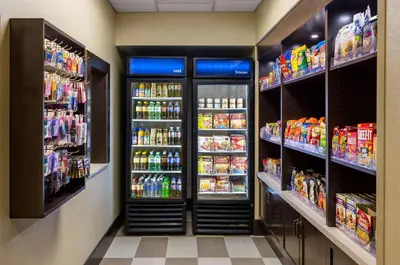 a grocery store aisle with drinks and drinks at Hampton Inn & Suites Philadelphia Montgomeryville in North Wales
