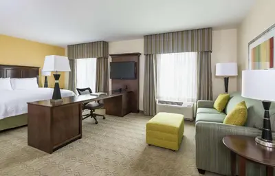 a hotel room with a bed and a desk at Hampton Inn & Suites Philadelphia Montgomeryville in North Wales