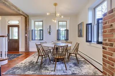 a dining room with a table and chairs at The Tannery in Lancaster