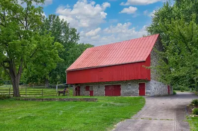 a red barn with a red roof at The Tannery in Lancaster