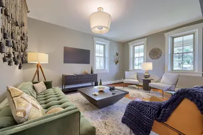 a living room with a couch and a table at The Tannery in Lancaster