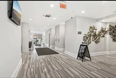 a hallway with a room with a sign in it at XL Studio - Luxury Studio Near Center City in Philadelphia