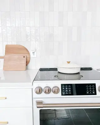 a kitchen with a stove with a bowl on top of it at Luxury Poconos Home Near Skiing, Lakes, & Waterparks in Tobyhanna