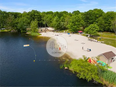 an aerial view of a large ball in the water at Modern chalet for 8 people with Fireplace, Hot Tub and nearby Skiing in Tobyhanna