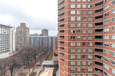 a view of a tall brick building in a city at Kips Bay 1br w doorman wd gym nr hospital NYC-1402 in New York