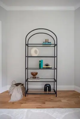 a black shelf with items on it in a room at Lakeview Villa with Private Hot Tub, Firepit & Spacious Decks with Breathtaking Cliff Views in Greenwood Lake
