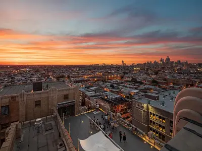 an aerial view of a city at sunset at Double Decker Roofdeck Gorgeous View in Passyunk in Philadelphia