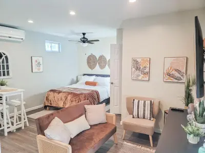 a living room with a bed and a couch at Unique Studio in York in York