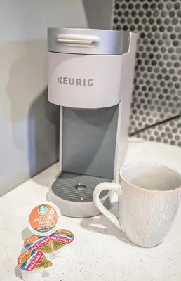 a coffee maker and a cup on a counter at Unique Studio in York in York