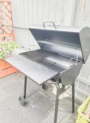 a bbq grill sitting on top of a patio at Unique Studio in York in York