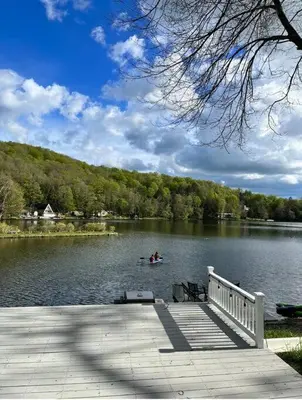 a person in a boat on a lake at Peaceful place at the lake in Susquehanna