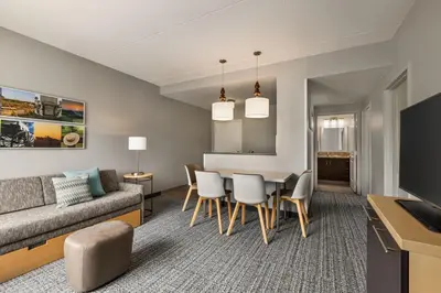 a living room with a couch and a table at TownePlace Suites by Marriott Harrisburg West/Mechanicsburg in Mechanicsburg