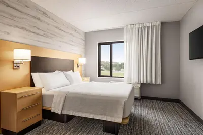 a hotel room with a bed and a window at TownePlace Suites by Marriott Harrisburg West/Mechanicsburg in Mechanicsburg
