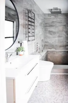 a bathroom with a white sink and a mirror at Sweet Lancaster Apt. B in Lancaster