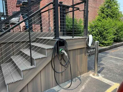 a balcony with a phone on the side of a building at Sweet Lancaster Apt. A in Lancaster