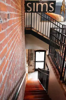 a brick stairway with a sign that reads sing at Sweet Lancaster Apt. A in Lancaster