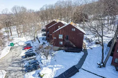 an aerial view of a barn in the snow at Skylift Lodge - Luxury Mountain Creek family condo in Vernon Township