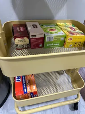 a shelf in a refrigerator filled with boxes at Cozy 2 BR suite, 10 min to NYC &Times Sq in West New York