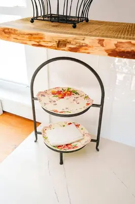 a metal chair with a plate on a shelf at Very Cozy, 2 Bedroom Farmhouse Apartment 2nd FL in Lancaster