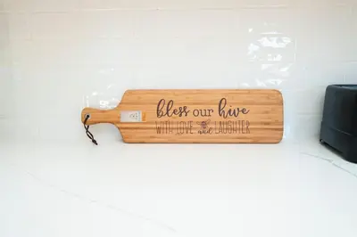 a wooden bench with a sign that reads black our lives wherever we happen at Very Cozy, 2 Bedroom Farmhouse Apartment 2nd FL in Lancaster