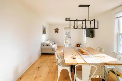 a dining room with a table and chairs at Very Comfy Farmhouse Apartment Unit A, 1st FL in Lancaster