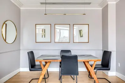 a dining room with a table and chairs at Chelsea 1br w doorman lounge nr food hall NYC-1196 in New York