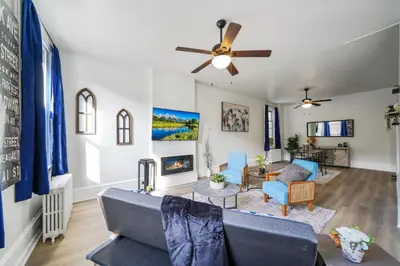 a living room with a couch and a ceiling fan at CONSHOHOCKEN: Quality & Location in Conshohocken