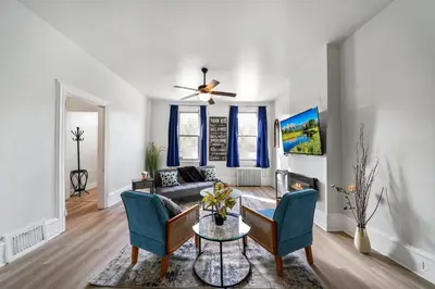 a living room with a couch and a table at CONSHOHOCKEN: Quality & Location in Conshohocken