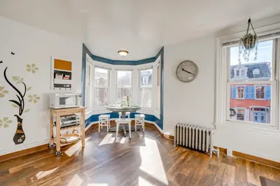 a kitchen with a table and chairs in a room at Charming Pottstown Apartment - Walk to Town! in Pottstown