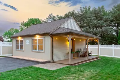 a house with a gazebo in a yard at AmishGuestCottage~cozystudio~hottub~patio in Gordonville