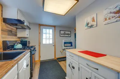 a kitchen with a sink and a counter top at 4 Mi to Big Boulder The Cozy Cabin on 8 Acres! in Blakeslee