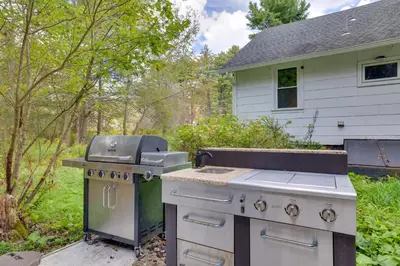 a stove and a sink in a yard at Private Hot Tub Poconos Babbling Brooke Cottage in Blakeslee