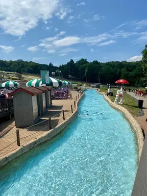 a water slide at a theme park with a pool at Gorgeous House in Camelback Mountain near lifts! in Tannersville