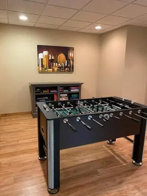 a large ping pong table in a room at Gorgeous House in Camelback Mountain near lifts! in Tannersville