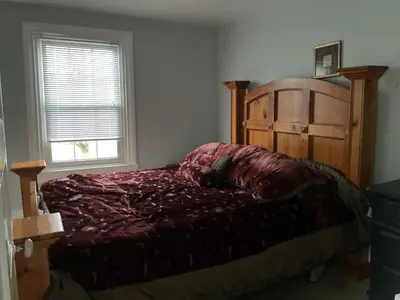a bedroom with a bed and a window at Amish Country Stay w/ Buggy Ride in Gap