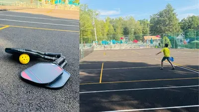 a boy is playing tennis on a tennis court at Lakefront, Game Rm, Arcade, Hot Tub, Pool, Pets in Bushkill