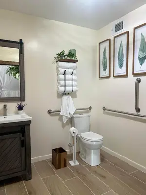 a bathroom with a toilet and a sink at Unique Escapes - Nature Lovers Geodome in Monticello