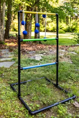a swing set with balls on it in a park at Modern Lodge on 6 acres - 15 mins to Camelback in Cresco