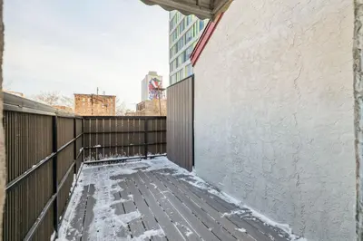a balcony of a building with snow on it at AF Stays - Philadelphia Callowhill in Philadelphia
