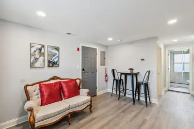 a living room with a couch and a table at AF Stays - Philadelphia Callowhill in Philadelphia