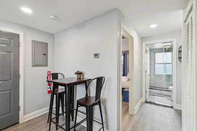 a dining room with a table and two chairs at AF Stays - Philadelphia Callowhill in Philadelphia