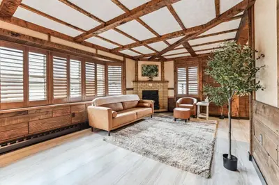 a living room with a couch and a fireplace at Luxury-Cabin Mount View *Gym*Game Room *Fire Place in Lehighton