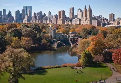a view of a park with a city in the background at Apartment near Times Square UWS Manhattan in New York