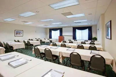 a conference room with tables and chairs in it at Parkview Inn & Suites, Lancaster Amish Country, PA in Lancaster