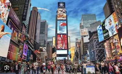 a crowd of people walking down a busy city street at Oasis Room at a Shared Apartment by Times Square in New York